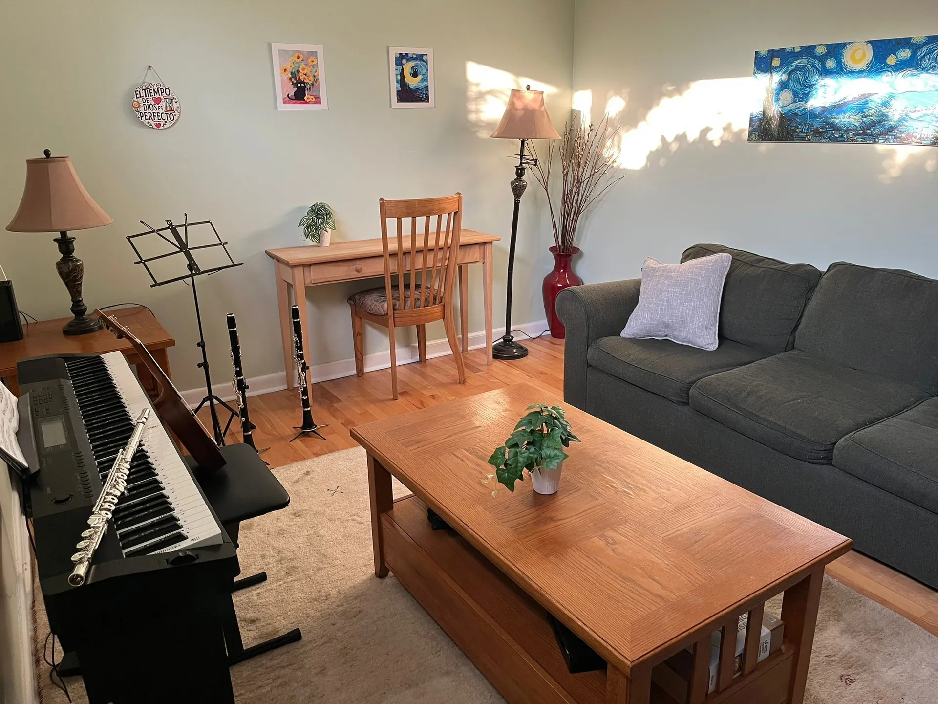 Welcoming Ottawa studio seating and lesson area with a keyboard and instruments